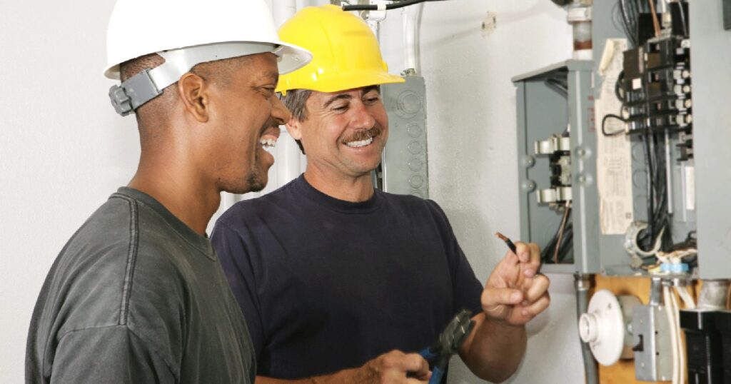 Electricians working to make sure company is OSHA compliant