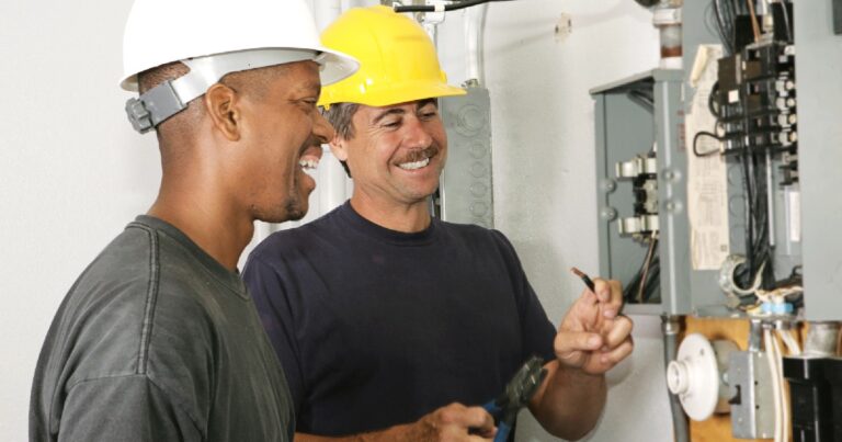 Electricians working to make sure company is OSHA compliant