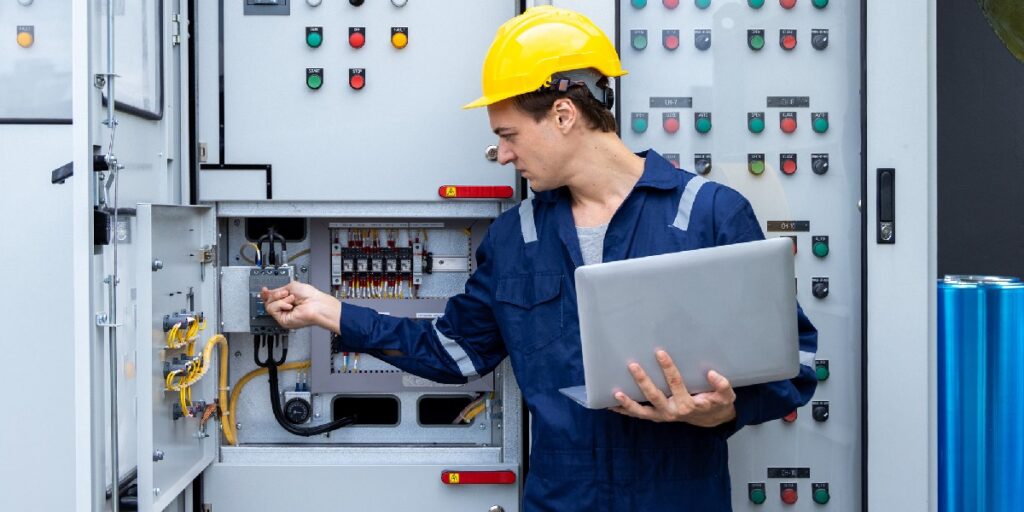 Commercial electricians in Denver working on electrical system