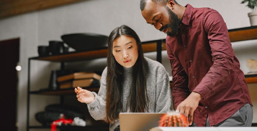 Team members adding new technology to business