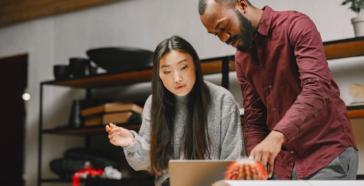 Team members adding new technology to business